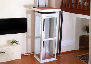 a white shaftless home lift